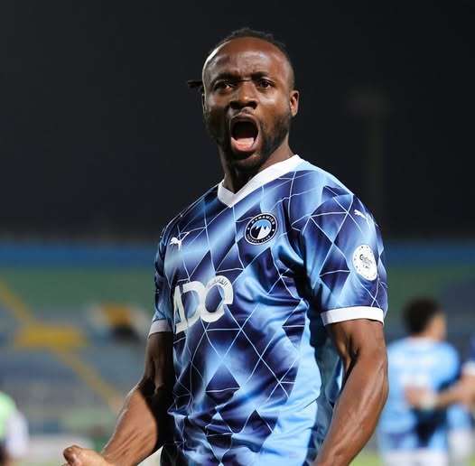 Fiston Mayele celebrating in a Pyramids FC jersey